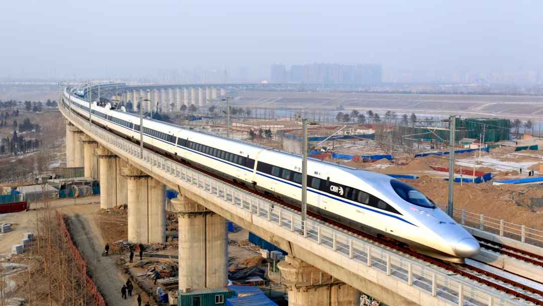 A high-speed train running from Beijing to Guangzhou over the Yongdinghe Bridge.