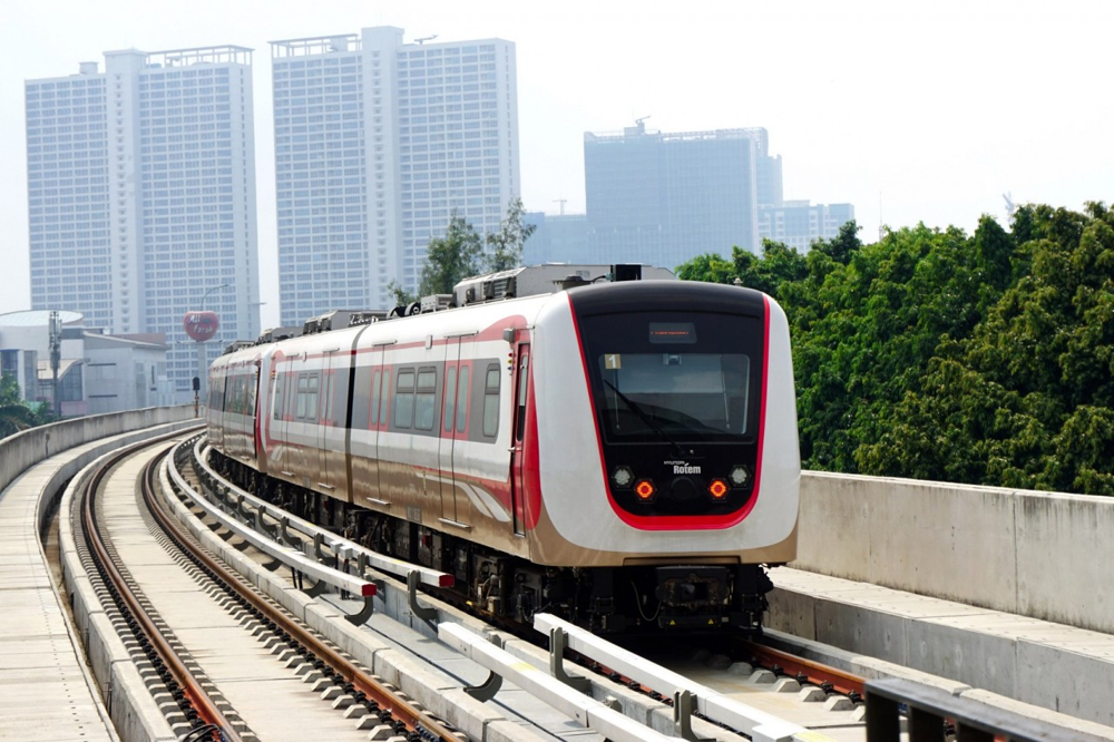 A light rail train operating on an elevated concrete viaduct in Asia